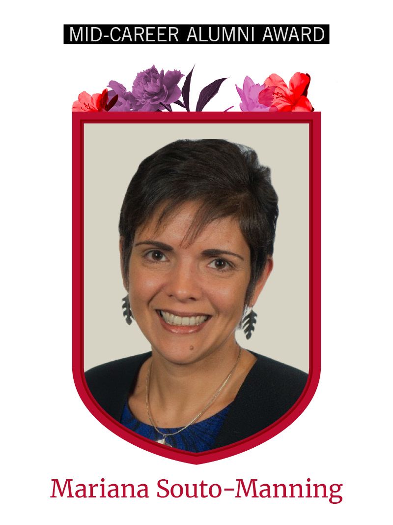 Photo of Mariana Souto-Manning framed by red shield shape and flowers. Text at the top reads "Mid-Career Alumni Award"