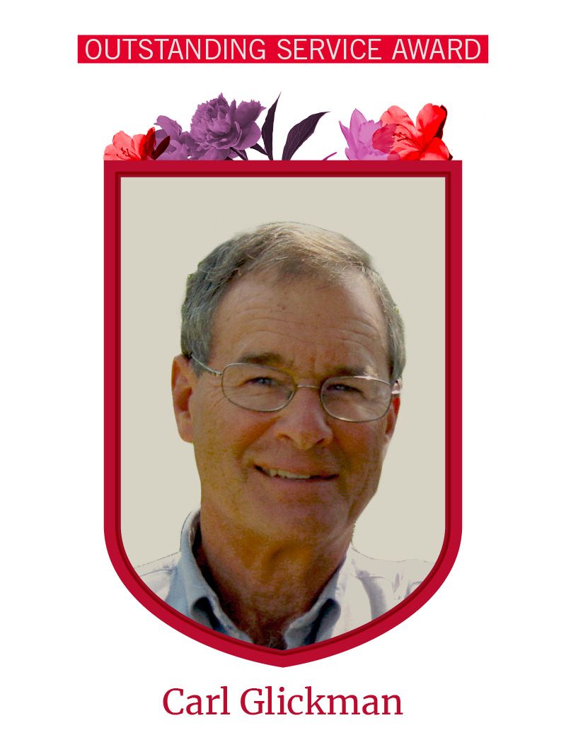 Photo of Carl Glickman framed by red shield shape and flowers. Text at the top reads "Outstanding Service Award"
