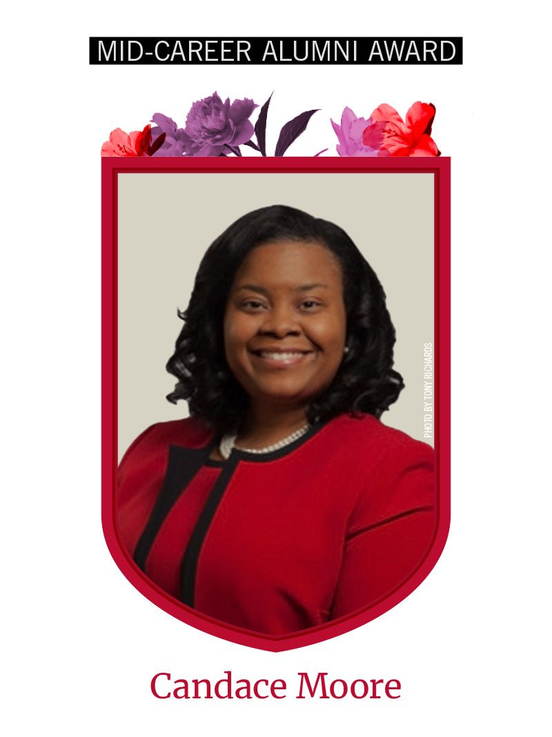 Photo of Candace Moore framed by red shield shape and flowers. Text at the top reads "Early Career Alumni Award"